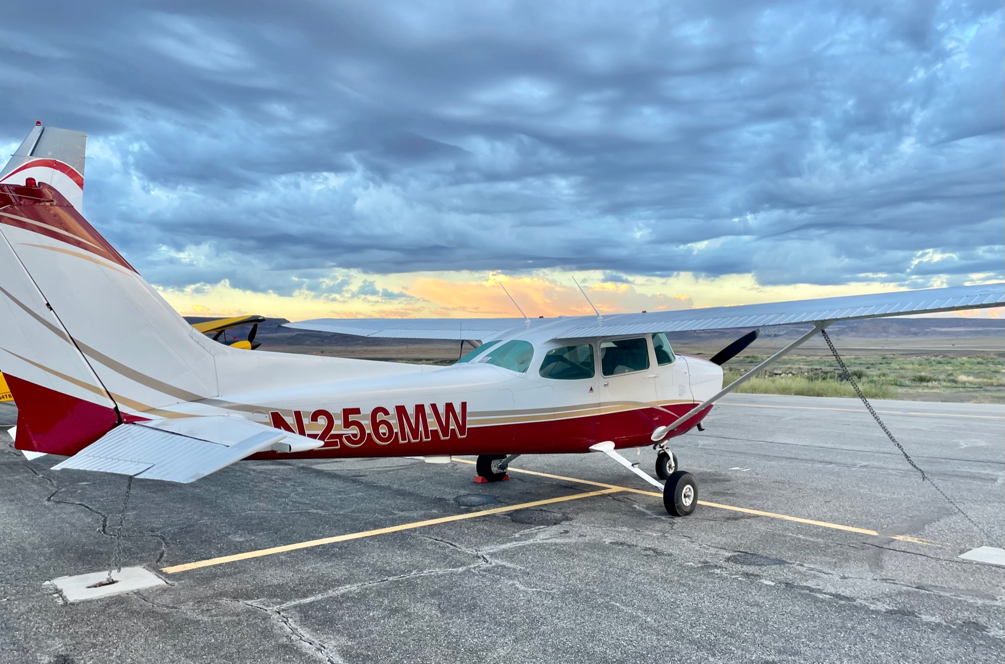 Small aircraft grounded during sunset